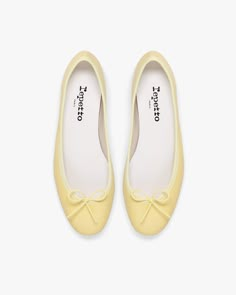 The Cendrillon ballerina, created at the request of Brigitte Bardot, is the iconic product of the Maison Repetto. A veritable dance shoe for the city, it is synonymous with comfort and elegance. Slightly indented, its shape will reveal your feet with grace and femininity.  Material: Nappa calfskin Color: Yellow limoncello Heels height: 1 cm Original country: France Details: Cowhide leather insole. Cotton lining. Leather wrapped heel. Stitch-and-return. Leather sole. Benefits of the selected manufacturing process: Stitch-and-return is the historical manufacturing process of Maison Repetto, developed by Madame Rose Repetto in 1947. The sole is sewn inside out before being turned inside out. This is an obvious way to create a flexible and emotional model. Dance Women, Tulle Tutu Skirt, Wrap Heels, Ballerina Shoes, Mary Jane Flats, Shoes Heels Pumps, Brigitte Bardot, Leather Wraps, Tops For Leggings