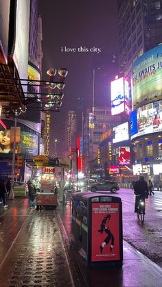 a busy city street at night with neon signs