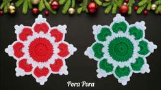 two crocheted doily designs on a black surface with christmas decorations in the background