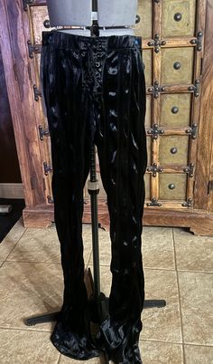 #1006 - Awesome pair vintage of stretch crushed velvet lip service pants, size M. Elastic waist, bell bottoms, corseted fly.     Unstretched measures:  28 inch waist, rise 11 and inseam 37 inches Black Velvet Bottoms For Night Out, Stretch Velvet Pants For Party, Stretch Velvet Pants For Night Out, Fitted Gothic Bottoms For Costume Party, Black Velvet Pants For Party, Full Length Velvet Bottoms For Night Out, Vintage Fitted Bottoms For Costume, Stretch Velvet Party Pants, Fitted Velvet Bottoms For Night Out