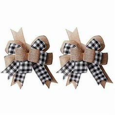 two black and white bows with burlocks on them