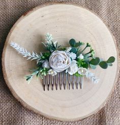 A stunning flower hair comb ideal for weddings. This floral hair piece is perfect for your adult or child bridesmaids or for the bride herself.  The hairpiece is adorned with white mulberry paper flowers, white lavender and faux foliage set on a silver comb.  The size of the comb is approx 15cm at the widest point.  Please take note before buying that I aim to make each item within 3-5 working days. Each order I receive is handmade to order, so if you require sooner than the timescale specified, Paper Flowers White, White Paper Flowers, White Mulberry, Bridesmaid Hair Comb, Bridesmaid Hair Pieces, Bridesmaid Hair Pins, Decorative Hair Combs, Floral Hair Pieces, Floral Comb