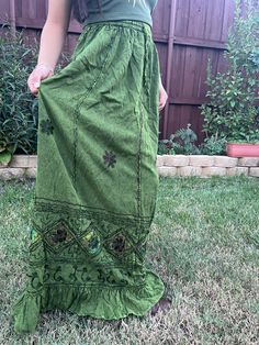 Introducing our Pari Vintage Vibe Green Embroidery Maxi Skirt, perfect for embracing those boho and hippie vibes! This stunning skirt features pleated borders that add a touch of elegance, while the maxi length offers a chic and comfortable fit.Crafted with fairly-core fashion inspiration, this skirt is ideal for creating enchanting cottage-core looks. Whether you're strolling along sandy shores or exploring hidden getaways, this skirt will ensure you're dressed to impress. Its flowing silhouett Hippie Boho Print Tiered Skirt, Bohemian Festival Bottoms With Lined Skirt, Bohemian Festival Lined Skirt Bottoms, Bohemian Festival Lined Skirt, Hippie Boho Print Maxi Skirt For Festivals, Festival Boho Print Maxi Skirt In Hippie Style, Festival Boho Print Maxi Skirt Hippie Style, Bohemian Maxi Skirt With Boho Print For Festival, Festival Hippie Boho Print Maxi Skirt