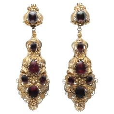 Early 19th Century Cabochon Garnet Drop Earrings c.1840s Composition: 15K Yellow Gold and Cabochon Garnets Color: 15K Yellow Gold Handmade 19th Century Jewelry, 1860 Jewelry, Period Jewelry, Garnet Drop Earrings, Jewellery Vintage, Picasso Jasper, Jasper Earrings, Reference Poses, Vintage Jewels