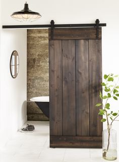 an image of a wooden sliding door in the bathroom