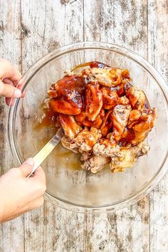 Everyone loves these wings! This Crockpot BBQ Chicken Wings recipe is such an easy way to make chicken wings and the perfect way to feed a crowd super easily. No frying required! These slow cooker wings get tender and juicy in the slow cooker, then a quick stint in the oven crisps up the outside for perfectly cooked wings every time. We love the generous layer of sticky-sweet sauce! These wings are equally perfect for game day or easy family dinners. Crock Pot Wings, Honey Bbq Wings