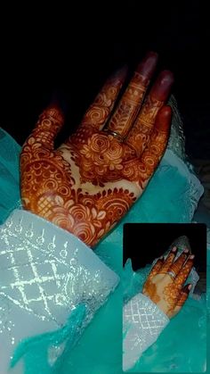 a woman's hand with henna on it is shown in the image above