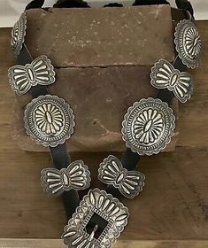 (eBay) navajo sterling silver concho belt. hand stamped quality piece buckle 3” by 2 1/4” conchos 2 1/2” by 2 1/4” butterfly’s 2” by 1 1/2” 14 pieces 45” long (leather) leather can be trimmed to length over 50 years old we ship USA only! (No Alaska or Hawaii) Navajo Concho Belt, Concho Belt Silver, Luxury Southwestern Concho Belts, Belt Crafts, Black Concho Belt, Leather Belt Crafts, Vintage Silver Concho Belt, Navajo Culture, Concho Belt