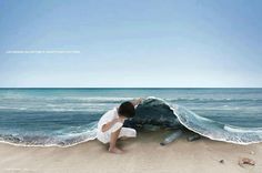 a person kneeling down on the beach with a bottle in front of them and an ocean wave coming towards him