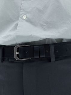 This is a refined and minimal belt made out of Italian genuine leather. With design detail of 7 hole for adjustable sizing and luxurious metal silver buckle, it gives a refined and trendy mood to your look.- Italian genuine leather- 7 Hole design- High durability and comfortable wear- Unisex item Modern Silver Belt With Buckle Closure, Modern Black Belt With Rectangular Buckle, Black Leather Belt With Buckle Closure, Black Belt With Buckle Closure, Luxury Men's Semi-formal Belt Buckles, Modern Square, Black Belt, Suspenders, Leather Belt