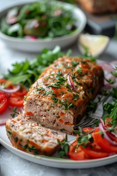 Meatloaf garnished with herbs, accompanied by fresh sliced tomatoes and greens on a plate. Healthy Turkey Meatloaf, Turkey Meatloaf Recipe Easy, Easy Turkey Meatloaf, Turkey Meatloaf Healthy, Turkey Meatloaf Recipe, Greek Lemon Rice, Healthy Meatloaf, Turkey Meatloaf Recipes, Homemade Meatloaf