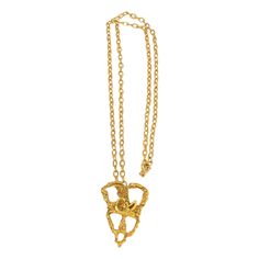 This lovely Christian Lacroix Paris pendant necklace features a stylized knitting lace design with gilded metal all textured and topped with the "CL" logo. The long gilt metal chain has a spring-ring closing clasp. The pendant is marked underside with the Christian Lacroix oval brand logo. Measurements: The necklace's total length is 23.62 in. (60 cm) - the drop is 13 in. (33 cm) - the pendant is 1.13 in. wide (2.9 cm) x 1.57 in. high (4 cm). Cl Logo, Knitting Lace, Metal Lace, Christian Lacroix, Accessories Jewelry Necklace, Lace Knitting, Lace Design, Metal Chain, Spring Rings