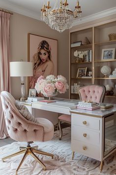 an elegant home office with pink and gold accents