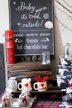 there is a sign that says baby warm it's cold outside, cool down here, frozen hot chocolate bar