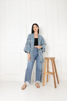 Our Japanese inspired 'Haori Jacket' features a 'parang bunga' motif for effortless and gender neutral styling. ~This is a re-created Haori made with batik fabric. ~Easy to care kimono ~Washable kimono ~To go kimono jacket/outer ~ Pockets WHAT IS HAORI? What is Haori? It's a Kimono jacket that lengths around hip or thigh level with swinging box sleeves, they're shorter than typical Kimono.  Traditionally Haori is a jacket that is worn on top of a Kimono.  Haori can be paired with jeans, shorts, or even long skirts, it's known for an easy look to pair for a Japanese fashion look. SIZE -This will be a gender-neutral item -length is 72cm -Shoulder to shoulder will be 65cm -Sleeve to sleeve length will be 130cm WASH & CARE - It is recommended to wash them inside a net laundry bag with cold tem Kimono Outer Outfit, Outer Batik Long, Outer Outfit, Kimono Outer, Batik Outer, Batik Kimono, Outer Style, Outer Batik, Haori Jacket