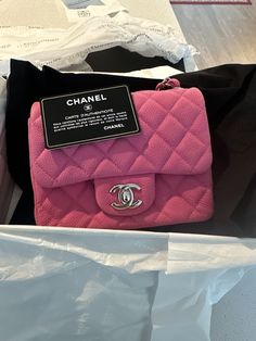 Gorgeous hot pink Chanel mini square in matte caviar with silver hardware. The bag is a 17 series, and I'll include the original box, dust bag, and authenticity card. I purchased this bag from Luxe du Jour a few weeks ago but changed my mind. The photos are from Luxe du Jour, which rated the bag a 9.5/10 condition. Feel free to message with any questions and send any reasonable offers. Chanel Mini, Pink Chanel, Chanel Bags, Classic Mini, Pink Aesthetic, Silver Hardware, My Mind, Hat Fashion, Chanel Classic