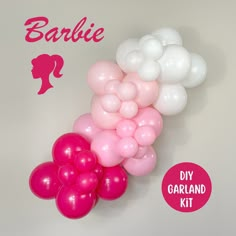 a bunch of pink and white balloons with the word barbie on it's side