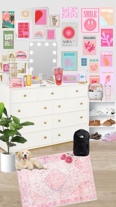 a white dresser sitting next to a mirror on top of a wooden floor covered in pictures