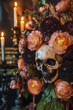 a skull with flowers and candles in the background