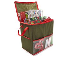 a large storage bag filled with lots of christmas cards and other holiday gifts in it