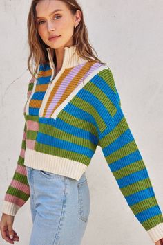 Evie Sweater Colorful striped ribbed pullover. Half-zip neckline Colorblock design Dropped shoulder Relaxed, slightly cropped fit Cotton/Acrylic Blend | Model is 5'10" and wearing a Small Monochromatic Dress, Sweater Colorful, Semi Cropped, Crop Top Sweater, Dress Hats, Sweater Sale, Clothes Collection, Rainbow Stripes, Striped Knit