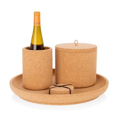 a cork container with a bottle in it and a coaster on the bottom that is holding a drink