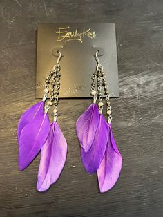 These stunning feather earrings make a big impact and are so lightweight! Perfect for sensitive ears, all Emily Kai earring feature sterling silver hooks. The feather earrings feature a rosary style strand of genuine gemstones.