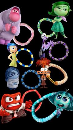 various cartoon character bracelets and rings on a black background with the characters from inside out