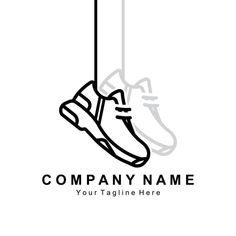 a black and white logo with a shoe hanging on a hook in the middle of it