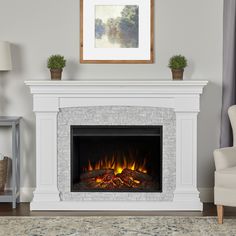 The Deland Grand electric fireplace is certain to become the focal point of any room. This fireplace features the Real Flame Grand Series firebox, which is 30% larger than our standard firebox and has incredible realism and clarity. The Deland is available in white with gray resin surround and gray with black wood surround. Real Flame 63-in W White Free Standing Fan-forced Flat Wall Electric Fireplace with Remote Control Included | 8290E-W White Electric Fireplace, Infrared Fireplace, Electric Fireplace Insert, Wall Mount Electric Fireplace, Real Flame, Fireplace Remodel, Indoor Fireplace, Home Fireplace, Fireplace Makeover