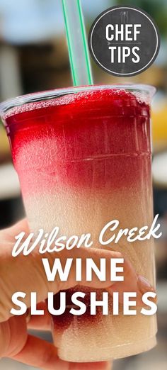 a person holding up a wine slushie with a straw in it and the words, wilson creek wine slushies