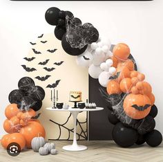 halloween decorations and balloons in the shape of pumpkins