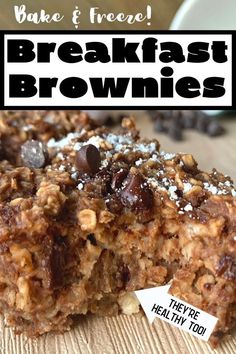 a close up of a granola bar with chocolate chips on top and the words, make it freeze breakfast brownies