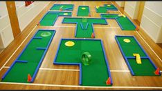 an indoor golf course is set up on the floor for kids to play with it