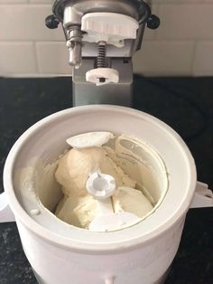 a close up of a food processor on a counter