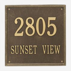 a sign that says sunset view with the words 2085 on it in gold lettering