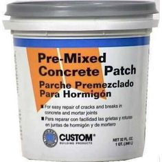 a bucket of concrete patching paste with the words custom written on it in spanish