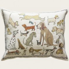 a white pillow with dogs on it