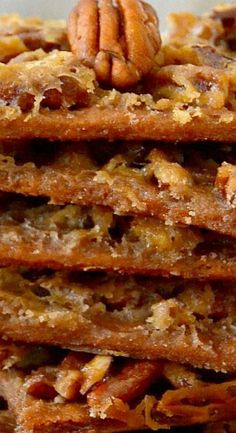 a stack of pecan cookies sitting on top of each other