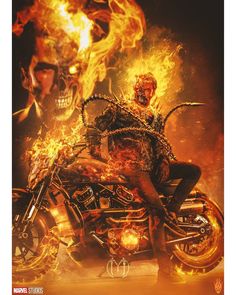 a man riding on the back of a motorcycle in front of a fire filled background