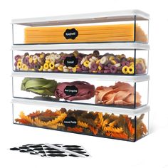 three tiered glass display case filled with different types of pasta