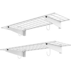 two white shelfs with hooks attached to them