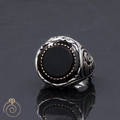 Men's birthstone for Leo onyx gemstone statement ring which will give you a head turning presence. This mystic, vintage style, engraved ring has a unique design for the polished, refined, and distinguished man. Perfect for casual and formal events, it will make your friends envious as you walk into the room full of confidence and pride. Looking for a unique, one of a kind GIFT FOR HIM, groomsman gift, father's day gift, teacher day gift? Look no further. This cool gemstone ring is the right answ Engraved Round Onyx Jewelry, Black Round Engraved Jewelry, Spiritual Black Engraved Sterling Silver Ring, Silver Onyx Gemstone Signet Ring, Black Spiritual Round Rings, Black Spiritual Rings With Gemstone, Spiritual Onyx Ring Jewelry, Engraved Onyx Rings For Gifts, Black Spiritual Gemstone Rings