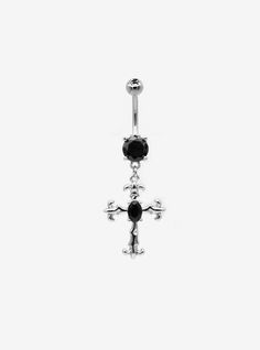 a black and white photo of a cross belly button ring with an attached navel bar