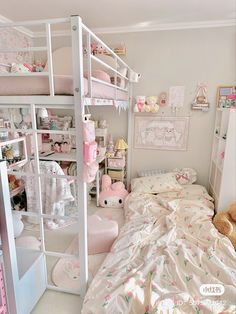 a bedroom with a bunk bed and stuffed animals