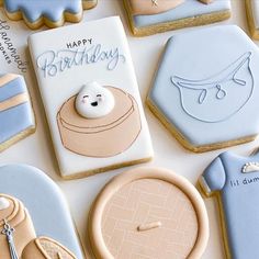 cookies decorated like baby items on a table