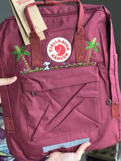 Welcome to our charming collection of hand-embroidered Fjallraven Kanken backpacks, meticulously crafted with love and precision. Elevate your style and stay organized on-the-go with these premium quality backpacks available in two convenient sizes:  - Medium (27x38x13cm)  - Large (32x42x13cm) + Key Features: - Hand-Embroidered Excellence: Each Fjallraven Kanken backpack is adorned with exquisite hand-embroidery, creating a unique and exclusive piece that sets you apart from the crowd. - Premium Kanken Backpack Embroidery, Kanken Embroidery, Kanken Bag, Kanken Classic, Embroidered Animals, Animals And Flowers, Snoopy Dog, Fjällräven Kånken, Aesthetic Backpack