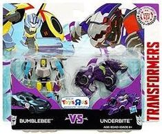 two action figures are shown in the packaging for toys r us, including one with a robot