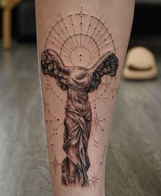 a person with a tattoo on their leg