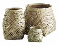 three woven vases with lids on each one